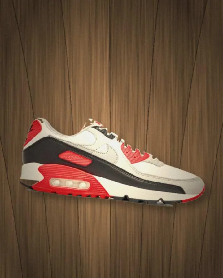 Before: a phone photo of Nike Air Max 90 sneakers on a wood floor